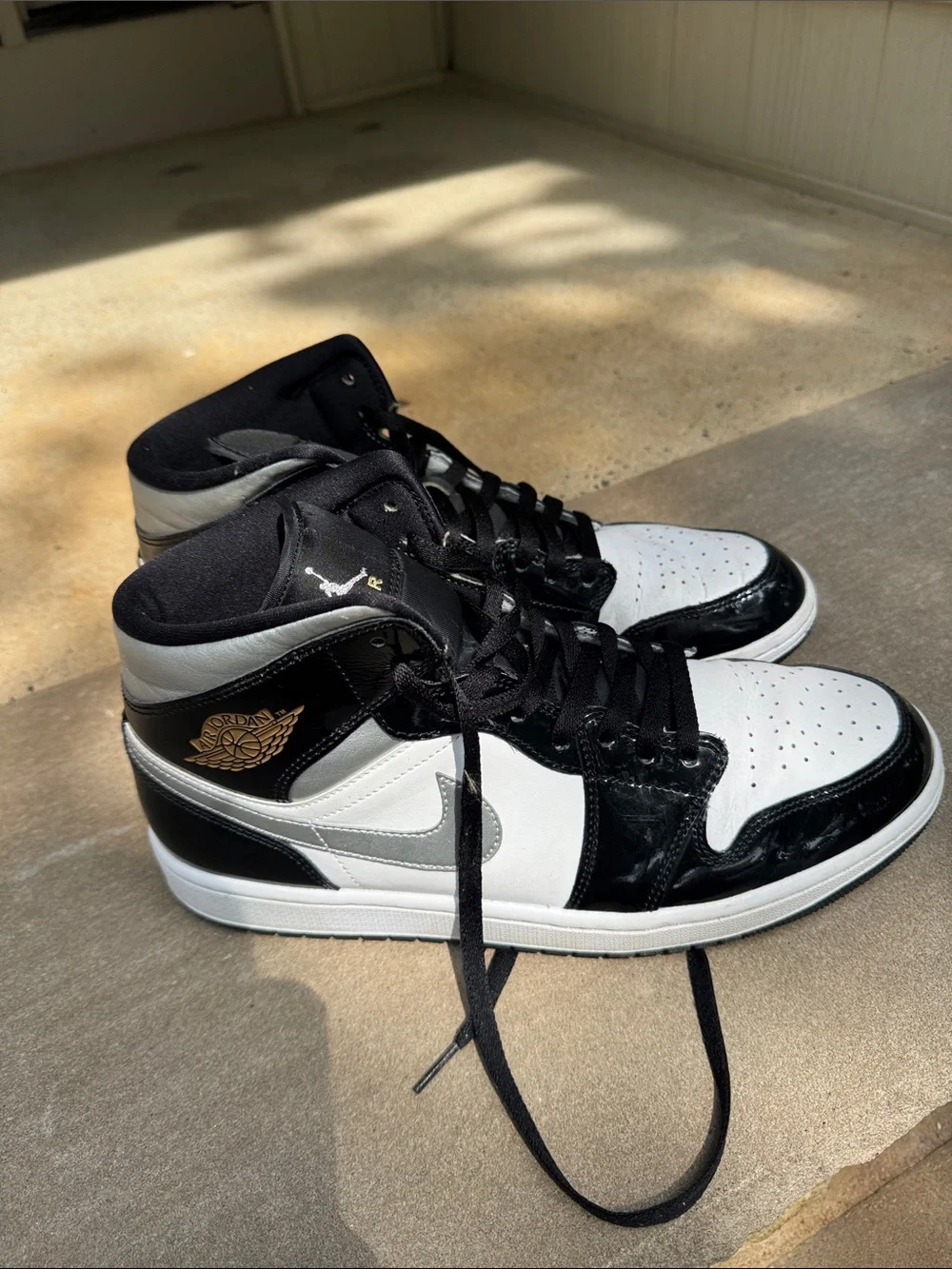 Jordan Retro High Top Sneakers in Black, White & Silver
